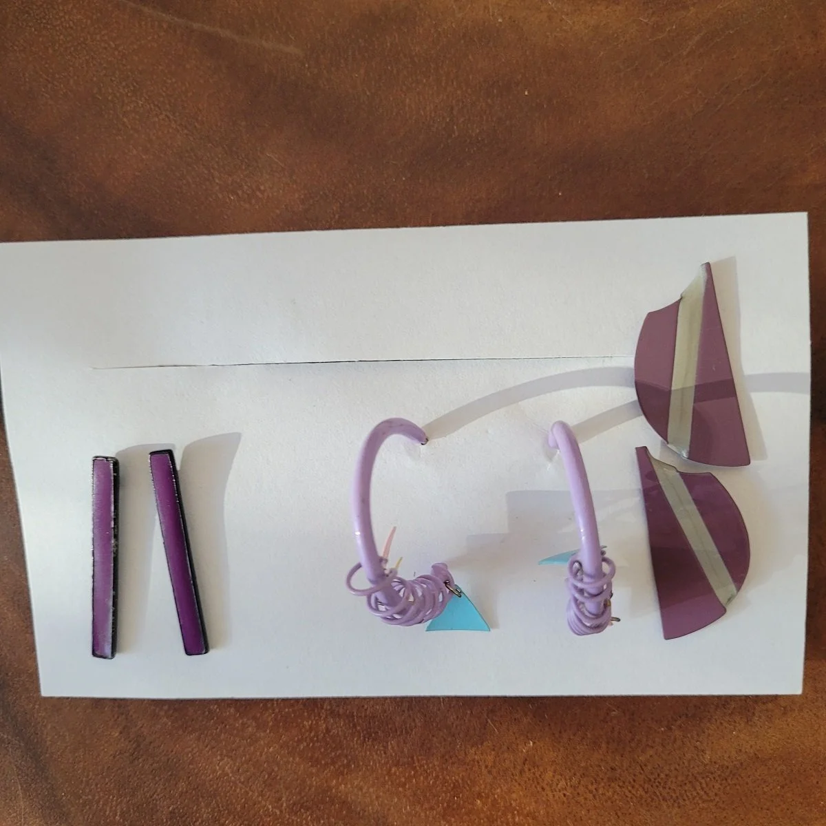 THREE PAIRS - 1980's New Wave Atomic Space Age Trio Purple Enamel Coated Metal Coil Hoop Pierced Earrings.jpg