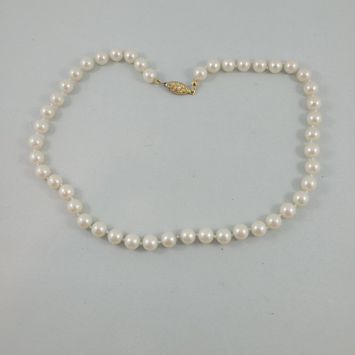 Knotted Iridescent Faux Pearl 7.8mm Bead 17.5 Inch Princess Necklace with Gold-tone Ornate Clasp Front View