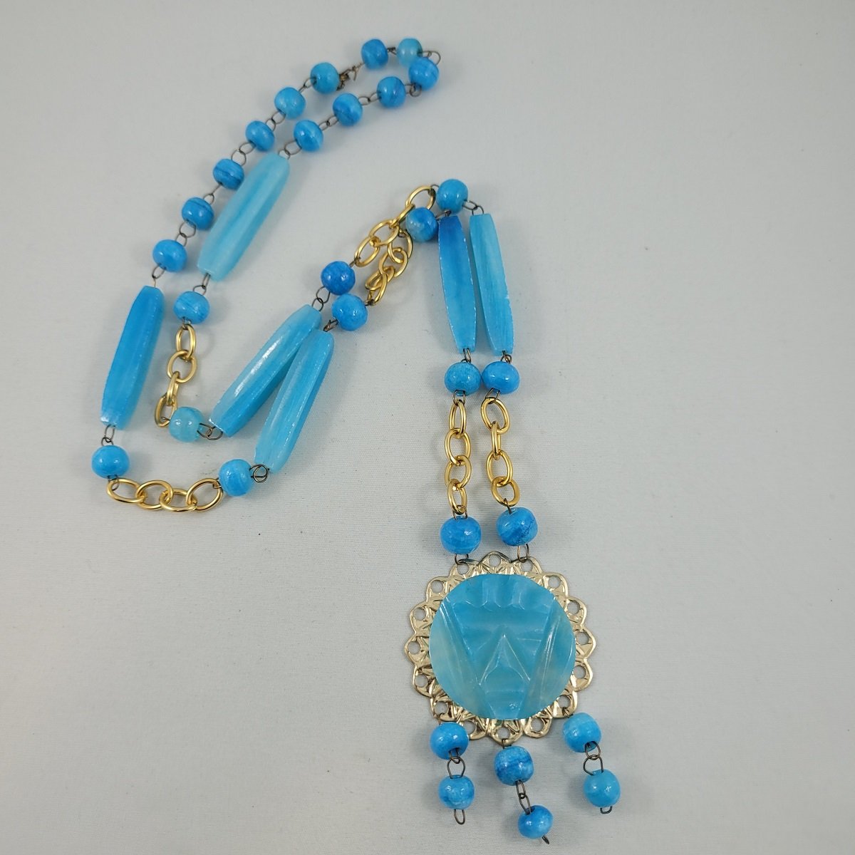 Boho 1970's Mexican Mayan Aztec Tribal Carved Warrior Mask Blue Agate Stone Gold Filigree Pendant Tubular Round Bead Wire Necklace Front Side