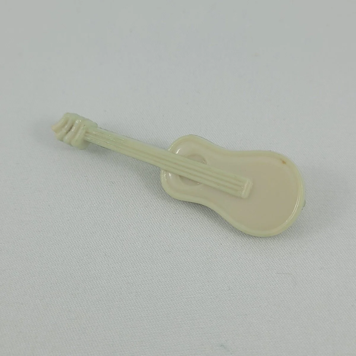 Antique Early Celluloid Plastic Spanish Guitar 2.25 Inch Brooch.jpg