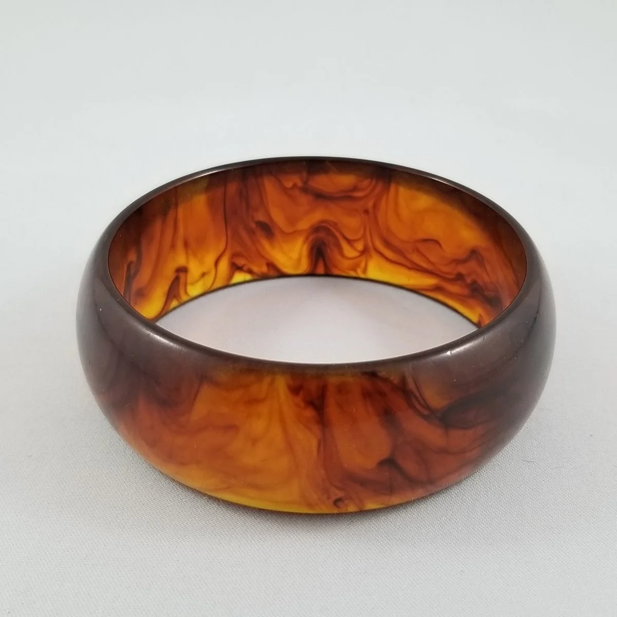 Art Deco 1940's Prystal Bakelite Root Beer Swirl Domed 1-Inch Wide Bangle Bracelet.jpg