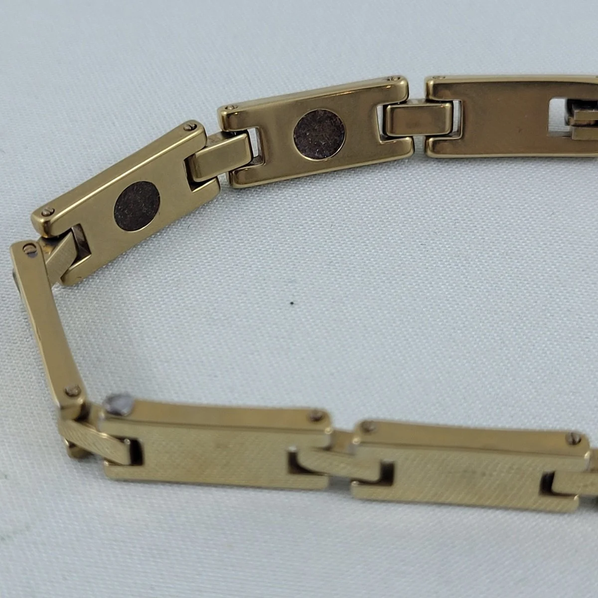Tungsten Marked Unisex .25 Inch Gold Magnetic Energy 7.5 Inch Panel Bracelet Close up