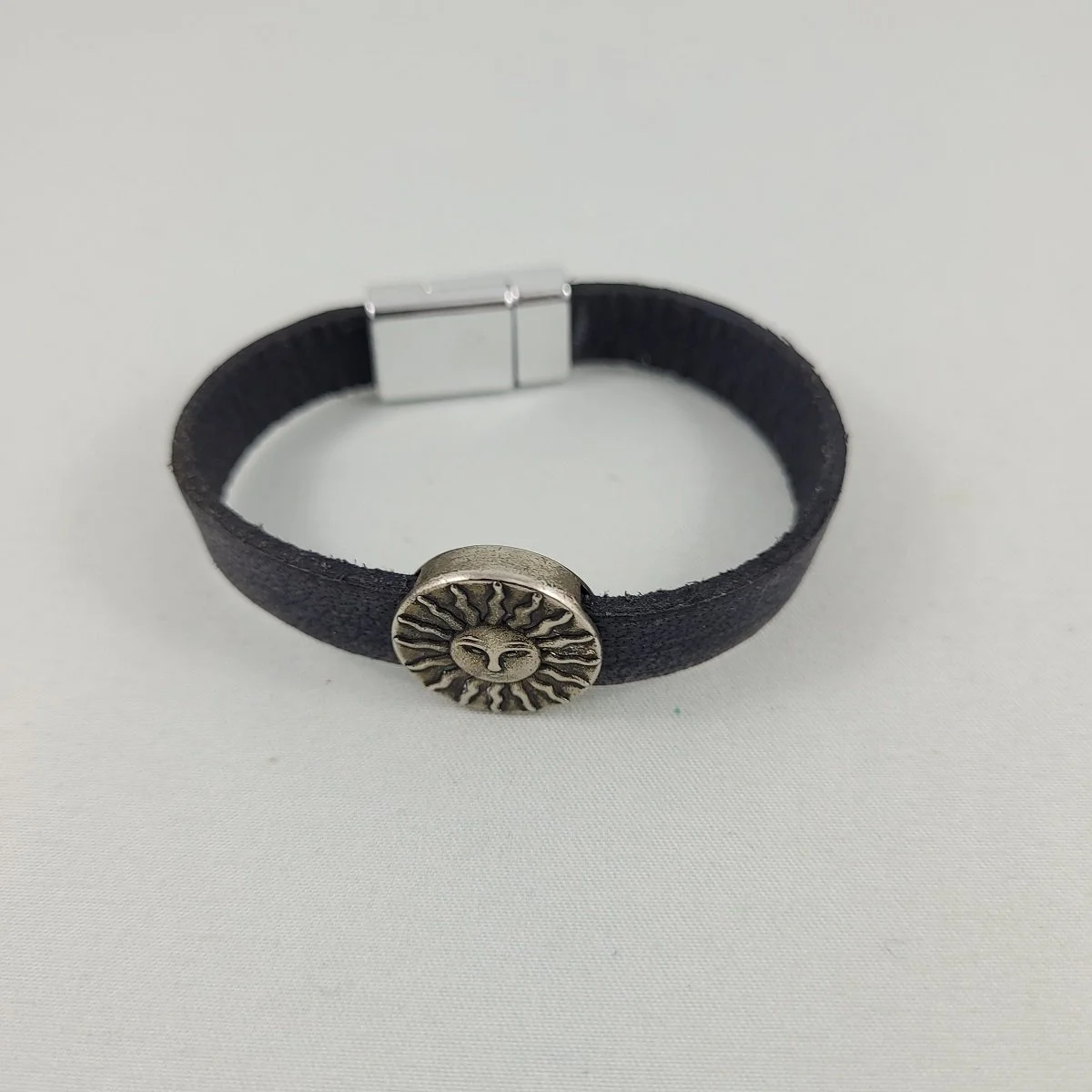 Boho Navy Blue Leather Magnetic Clasp 7 Inch Bracelet with .75 Inch Silver-tone Sun Face Slide Pendant.jpg