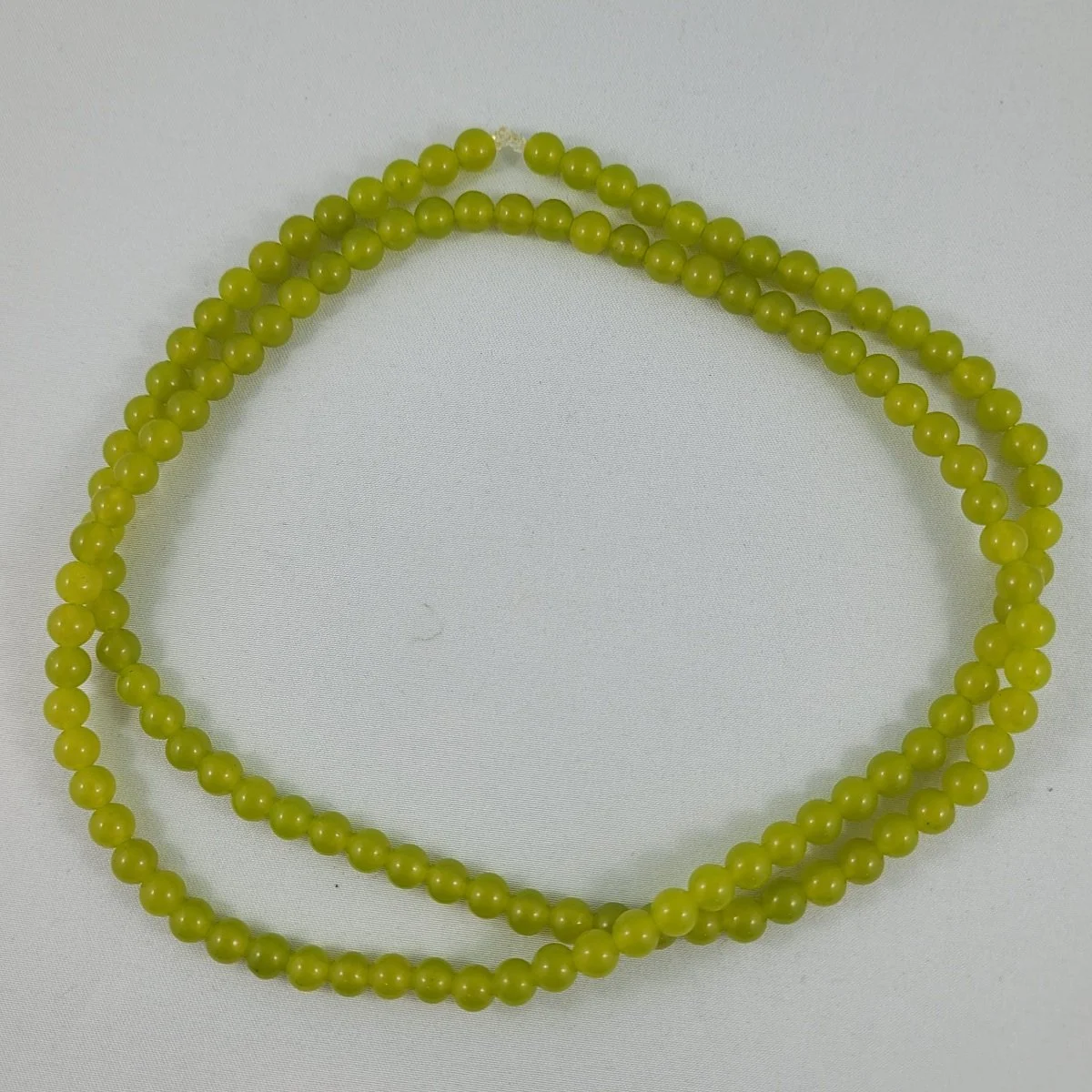 Chartreuse Glowing Green Translucent Peridot Jade 127 Semi-Precious Genuine Gemstone 6.4mm Round Beads on Stretch Cord 30 Inches.jpg
