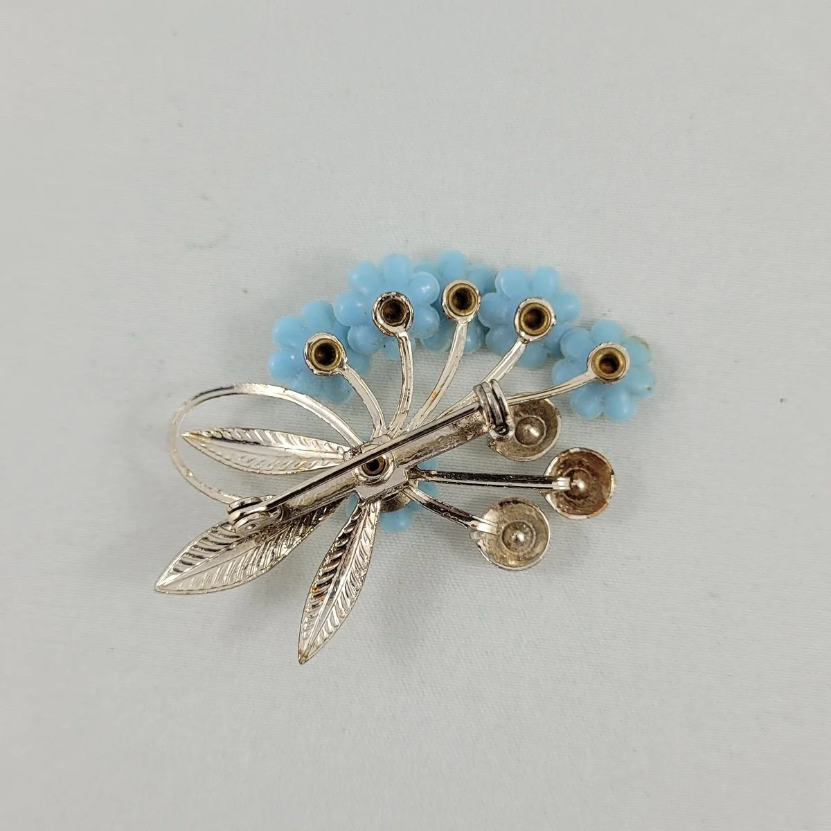 Coro Ice Blue Cornflower Daisy Spray Molded Thermoset Cellulose Acetate Plastic Flower Rhinestone Riveted Brooch -1.jpg (Copy)
