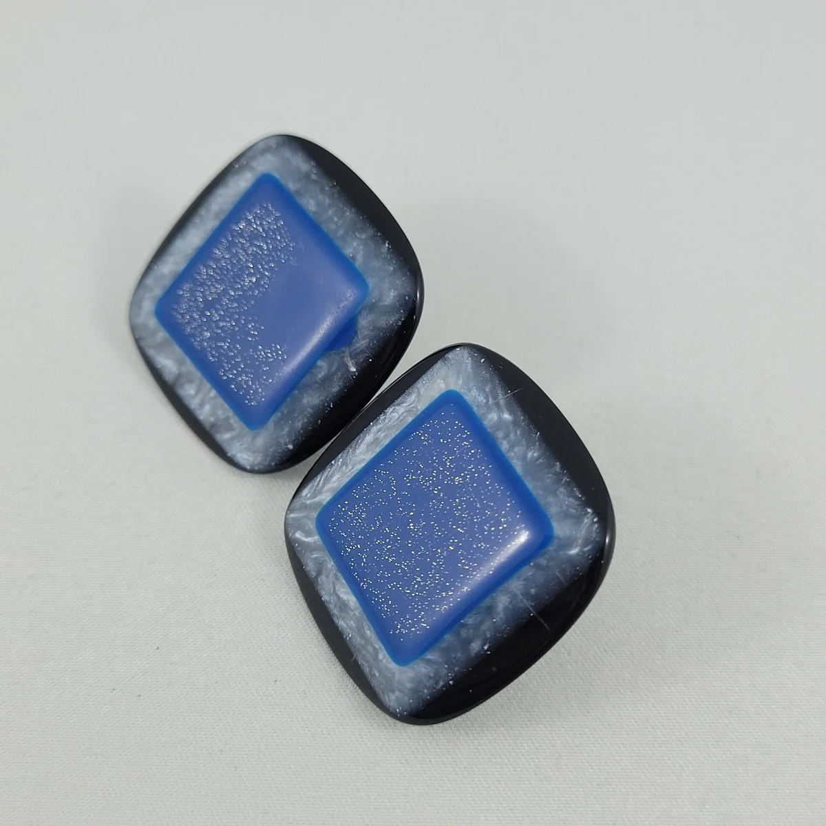 Lea Stein Inspired Cellulose Acetate Blue Glitter Grey Black Flat Pyramid 1.25 Inch Square Pierced Earrings Side View