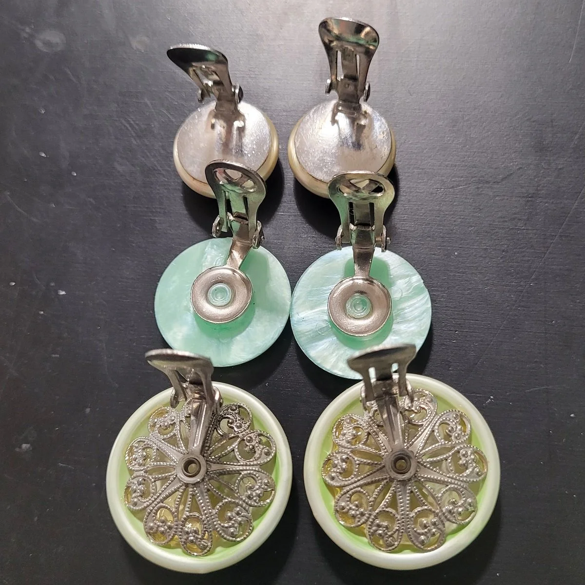 THREE PAIRS - 1960's Pearlized Luminescent Luster Mint Moonglow Lucite Saucer Button Domed Filigree Clip-on Earrings -3.jpg