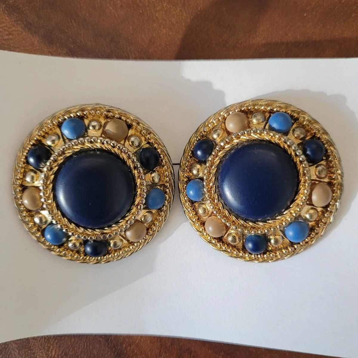 1980's - 1990's Nautical Equestrian Corporate Chic Oversized Statement Navy Taupe Cabochon Gold-tone Tiered Round Saucer Clip-on Earrings.jpg