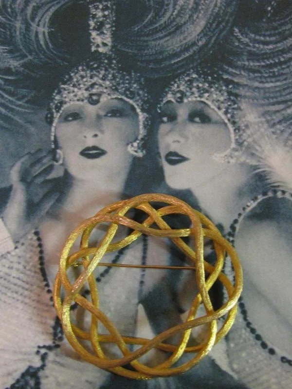 Brushed Goldtone Intertwined Free-Flow Rope Four Layered 3D 2.5 Inch Round Wreath Brooch Pose