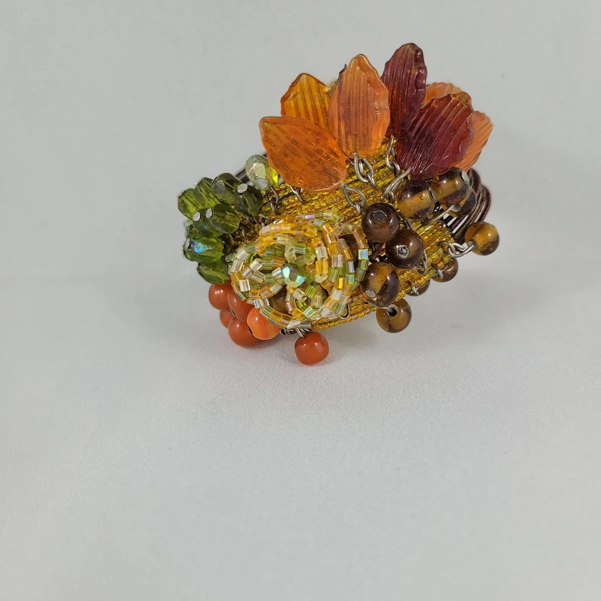Haskell Hess Inspired Multi Strand Memory Wire Autumn Theme Glass Bead Cluster Leaf Drops Open Cuff Wrap Bracelet.jpg