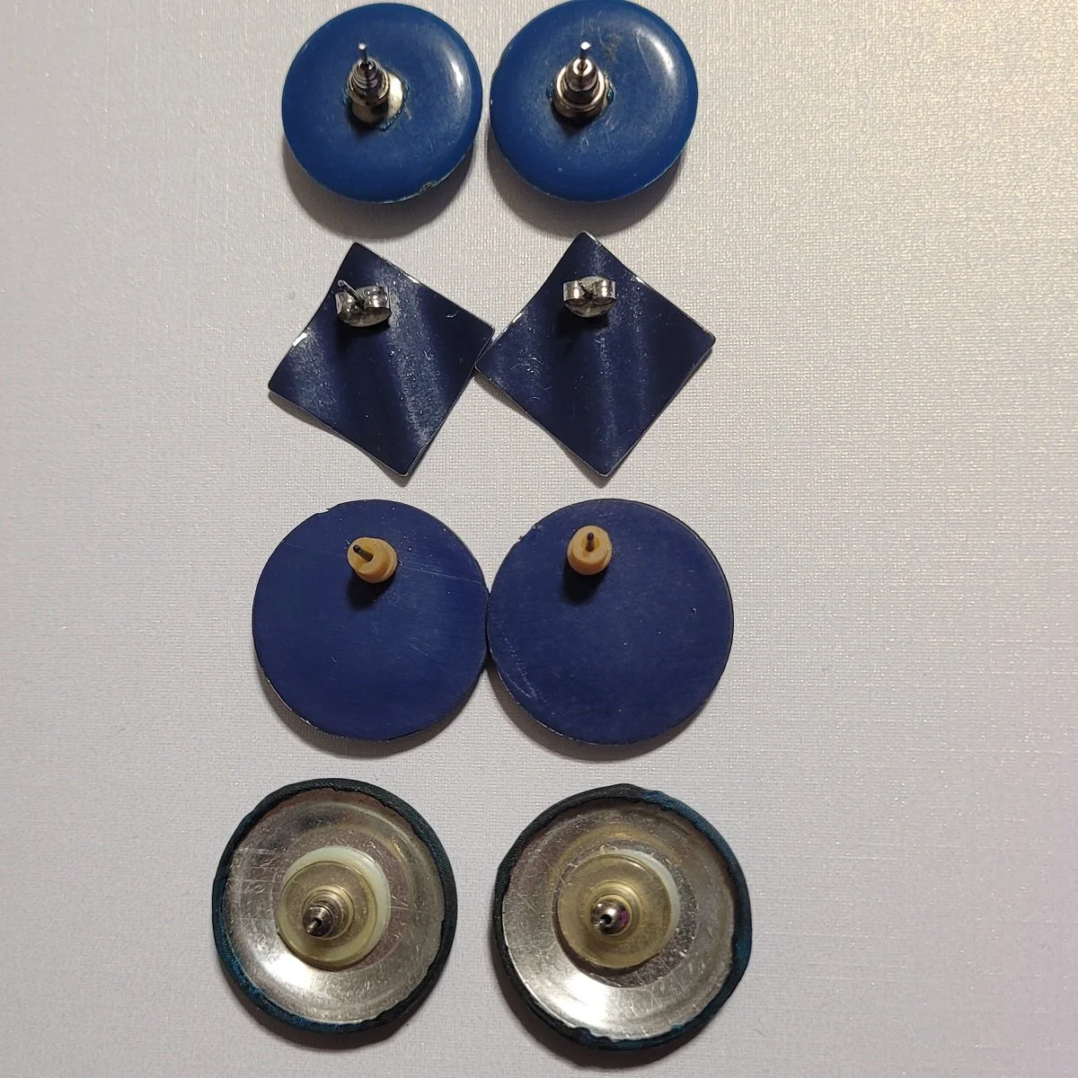 FOUR PAIRS - 1980's Round Navy Lucite Metal Wave and Fabric Wrapped Pierced Earrings -1.jpg