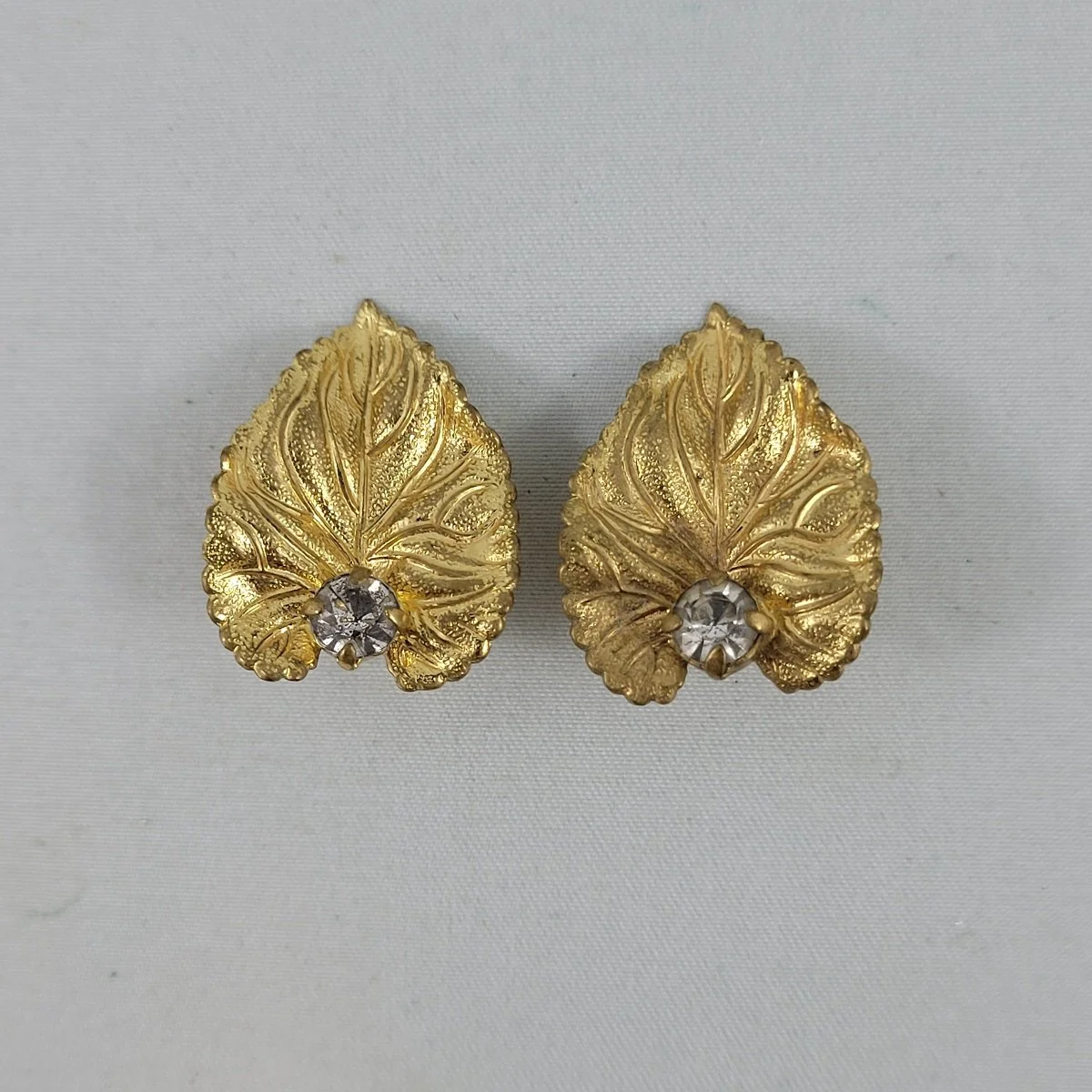 Marvella Gold Plated Naturelle Granulated Textured Organic Leaf Clear Rhinestone Clip-on Earrings (Copy