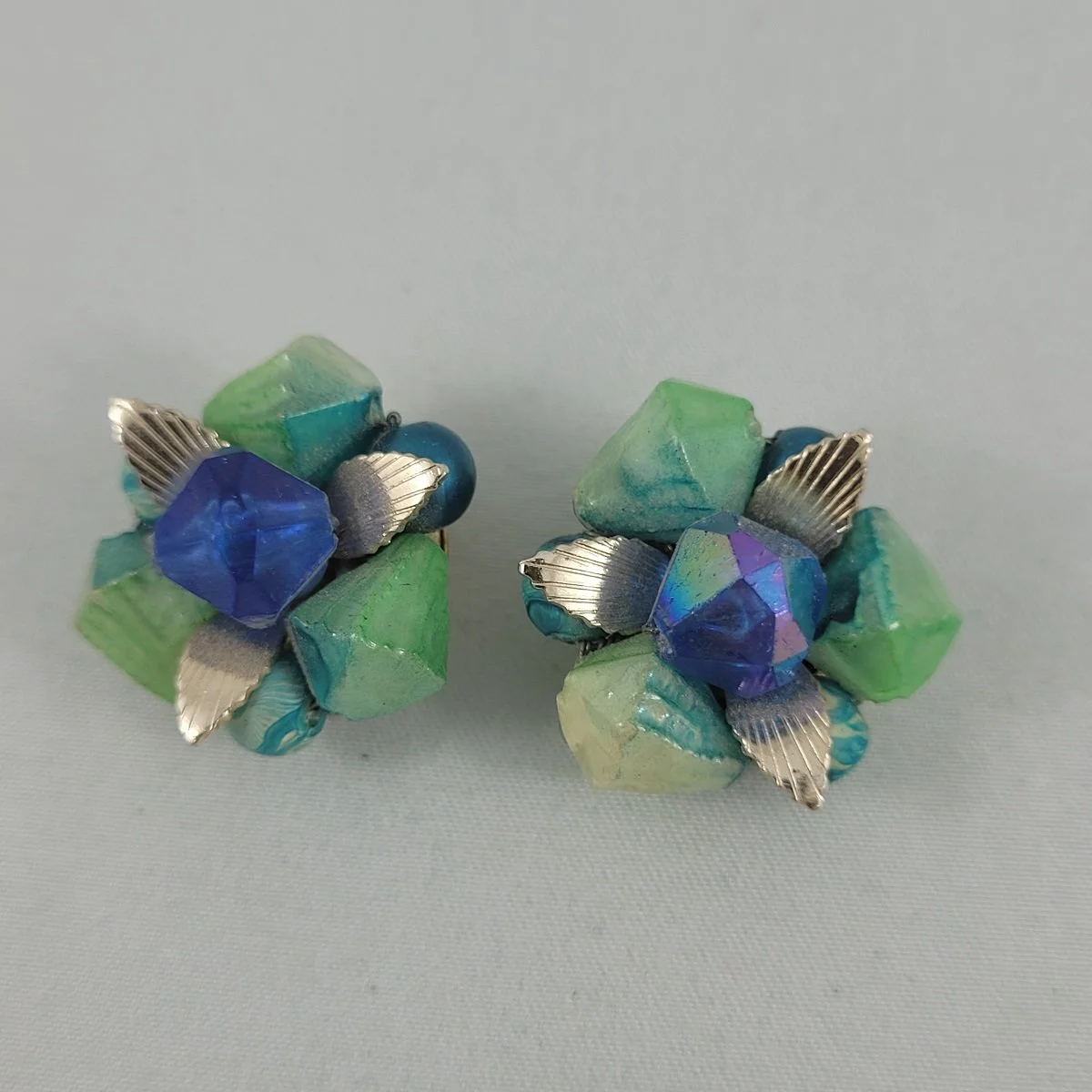 1950's Hong Kong Tie Dye Iridized Bicone Round Plastic Bead Cluster Flower Wire Wrapped 1 Inch Clip-on Earrings Front View