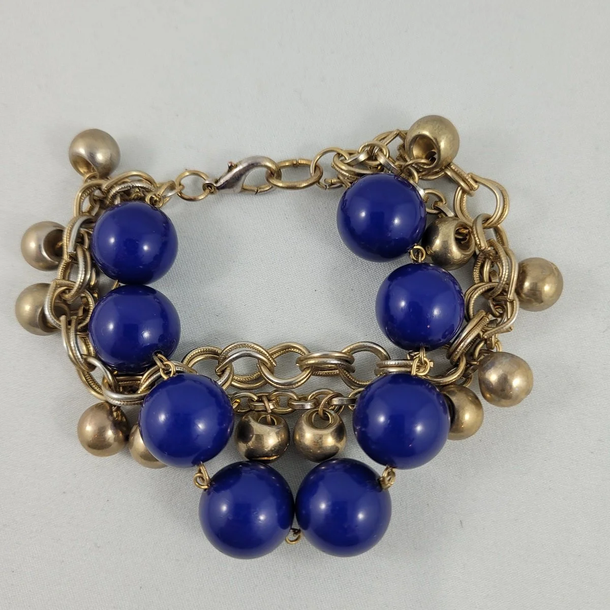 Triple Strand Washed Gold-tone Chain Navy Blue Round 16mm Bead Dangle Faux Bell 8 Inch Cha Cha Bracelet