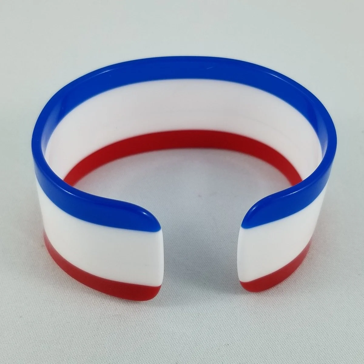 Space Age 1960's London Mod Architectural Patriotic Laminated Red White Blue Striped Lucite Cuff Bracelet -1.jpg