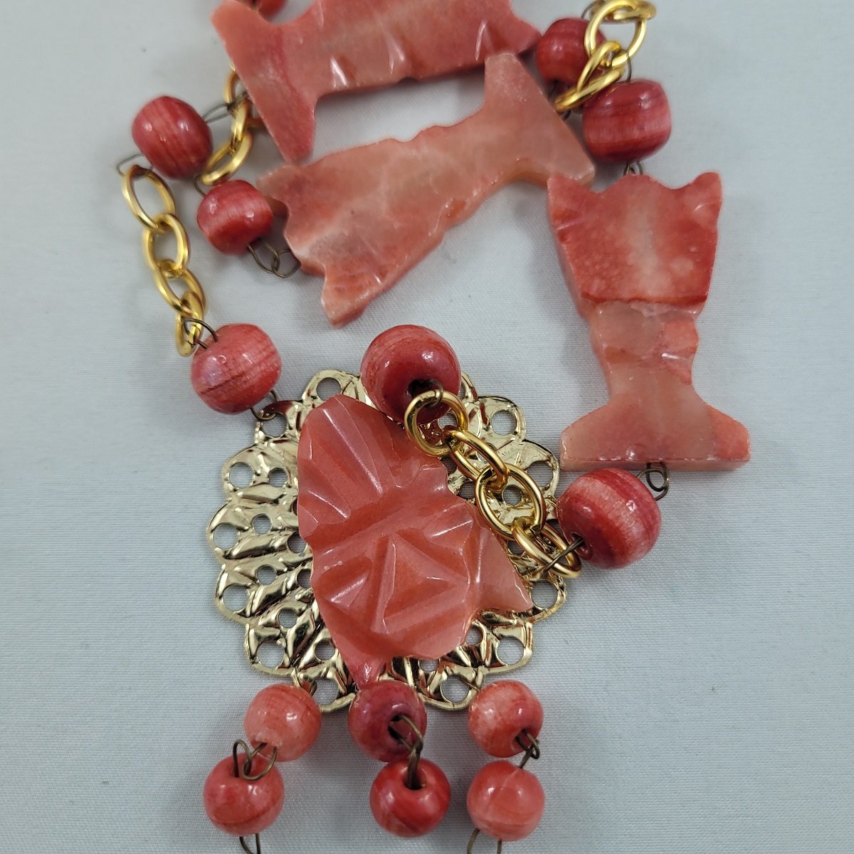 Boho Mexican 1970's Mayan Aztec Tribal Carved Mask Banded Coral Agate Stone Gold Filigree Pendant Round Totem Bead Wire Necklace Close up