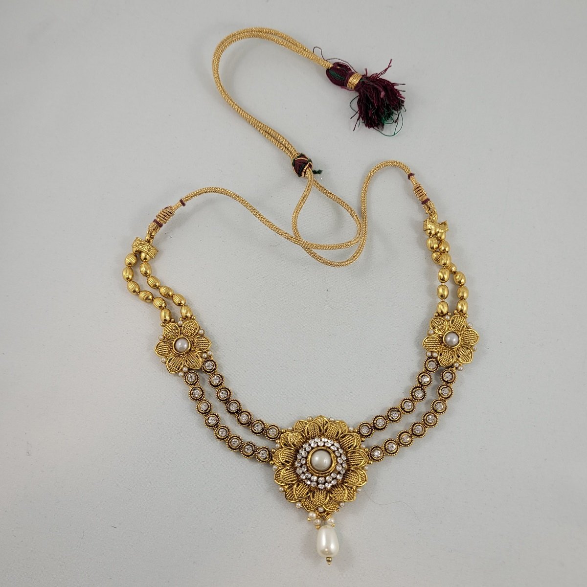 India Bollywood Kundan Hasli Style Triple Flower Rhinestone Pearl Drop Dori Gold-tone Necklace.jpg