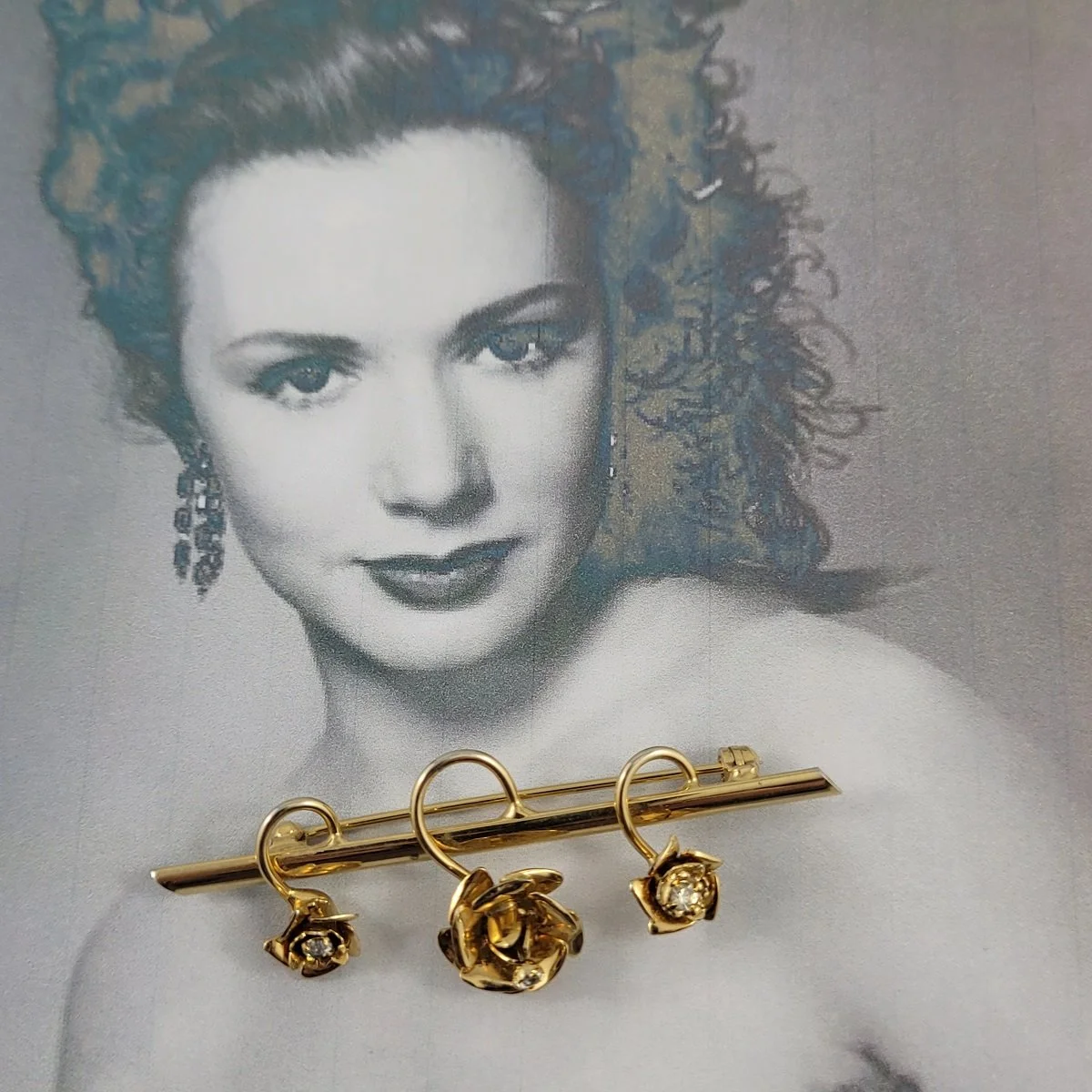 1960's Triple Clear Rhinestone Drop Flower 2.5 Inch Gold-tone Bar Brooch Pose