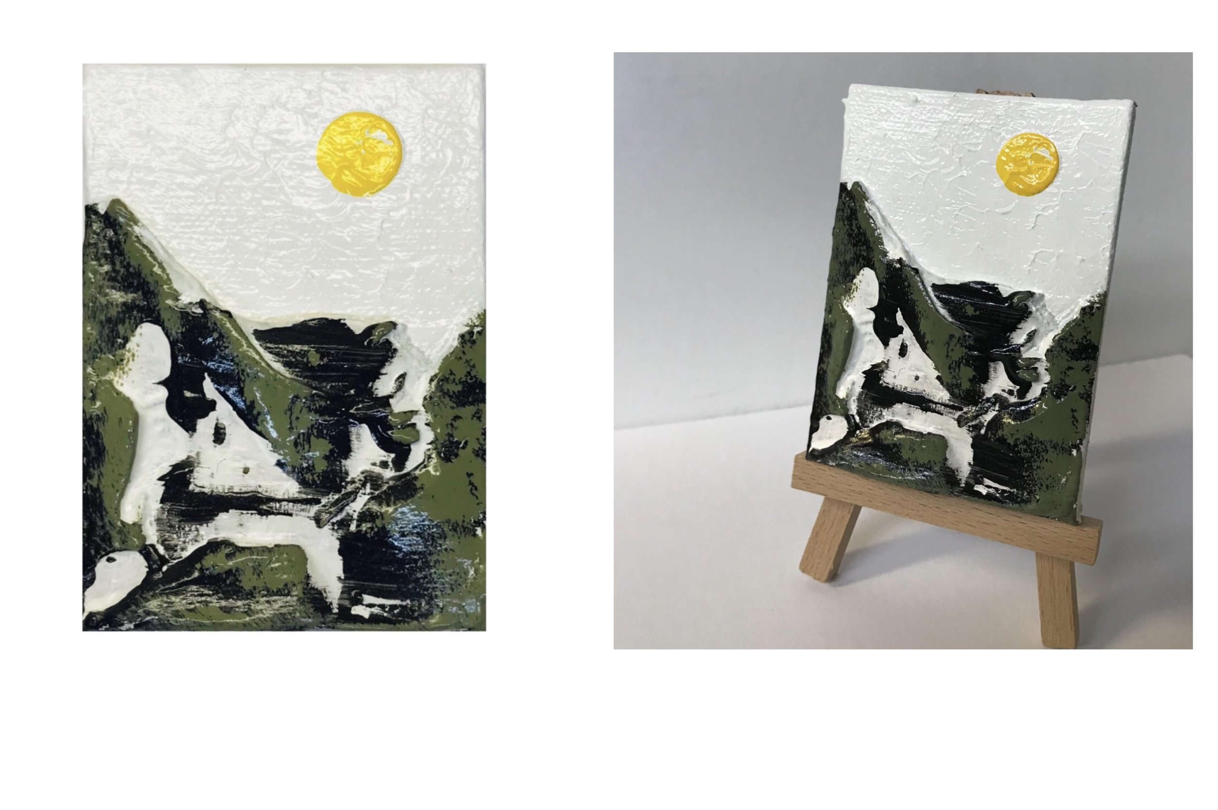 Part of the "Mini Mountains" series, created by Tamara Okun Valerine, 2020 | A landscape painting of snowy mountains, green hills, and a yellow sun, displayed on a small easel.