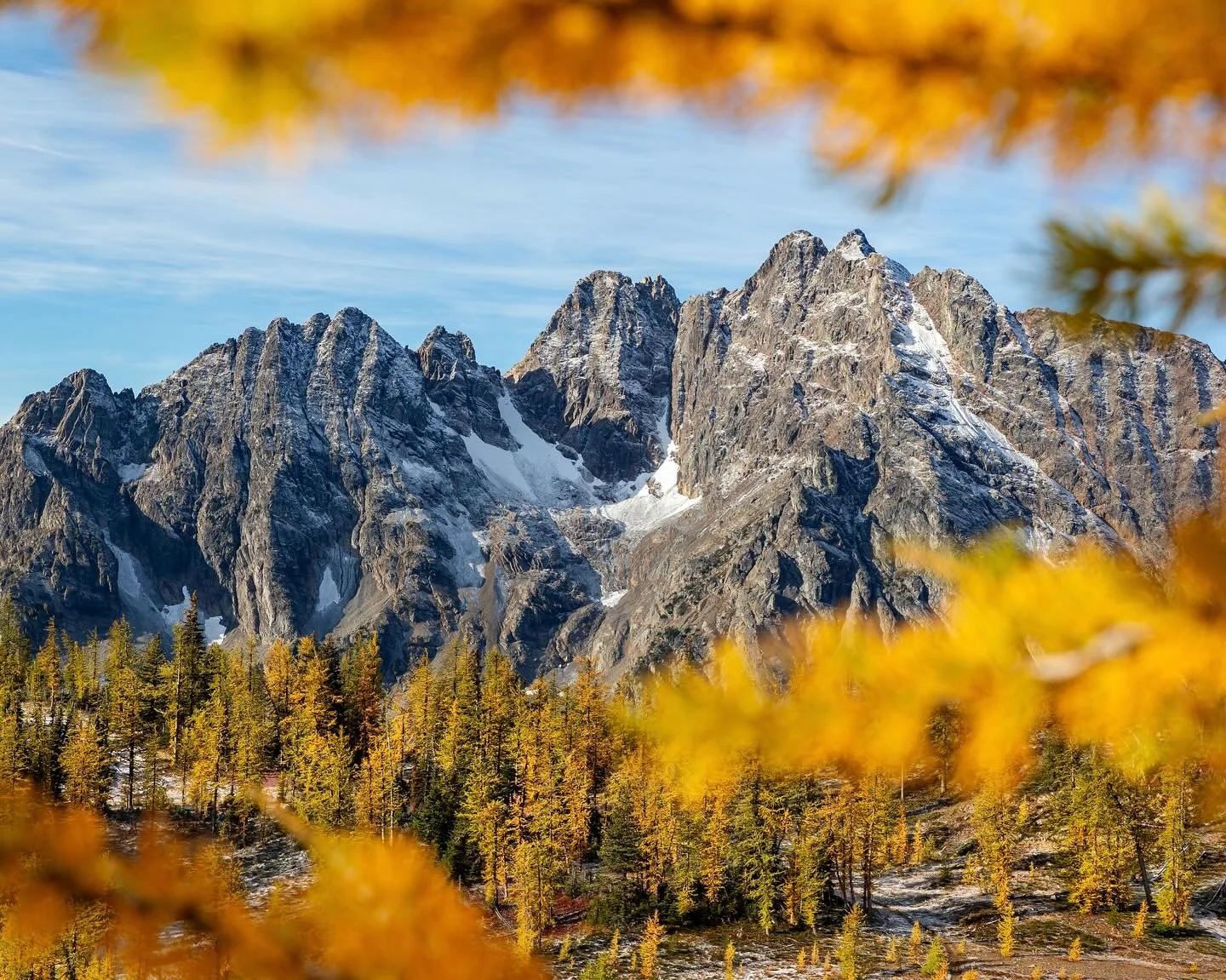 Day 2255: The first significant snow of the season in the Cascades is almost upon us! Last week there were very light scattered snow showers in the North Cascades that brought the first wisps of winter to the larch marchers, but this weekend we will 