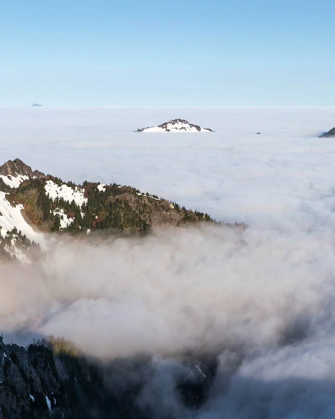 Day 2325: One of my favorite moments from last year was waking up above a cloud inversion in the Glacier Peak Wilderness. We were just out for a single night and my confidence in the forecast faltered as we hiked up. I thought for sure the inversion 