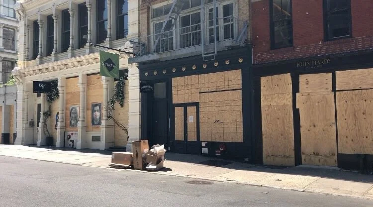 Businesses boarded up in Soho NYC
