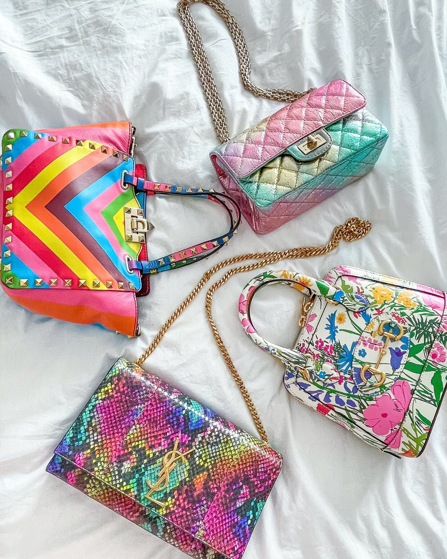 When you don&rsquo;t out grow your childhood of collecting @lisafrank stickers, playing with Polly Pockets and Barbies, and wishing unicorns were real, this is what a bit of your designer handbag collection looks like 🦄🌈
.
Some might think one rain