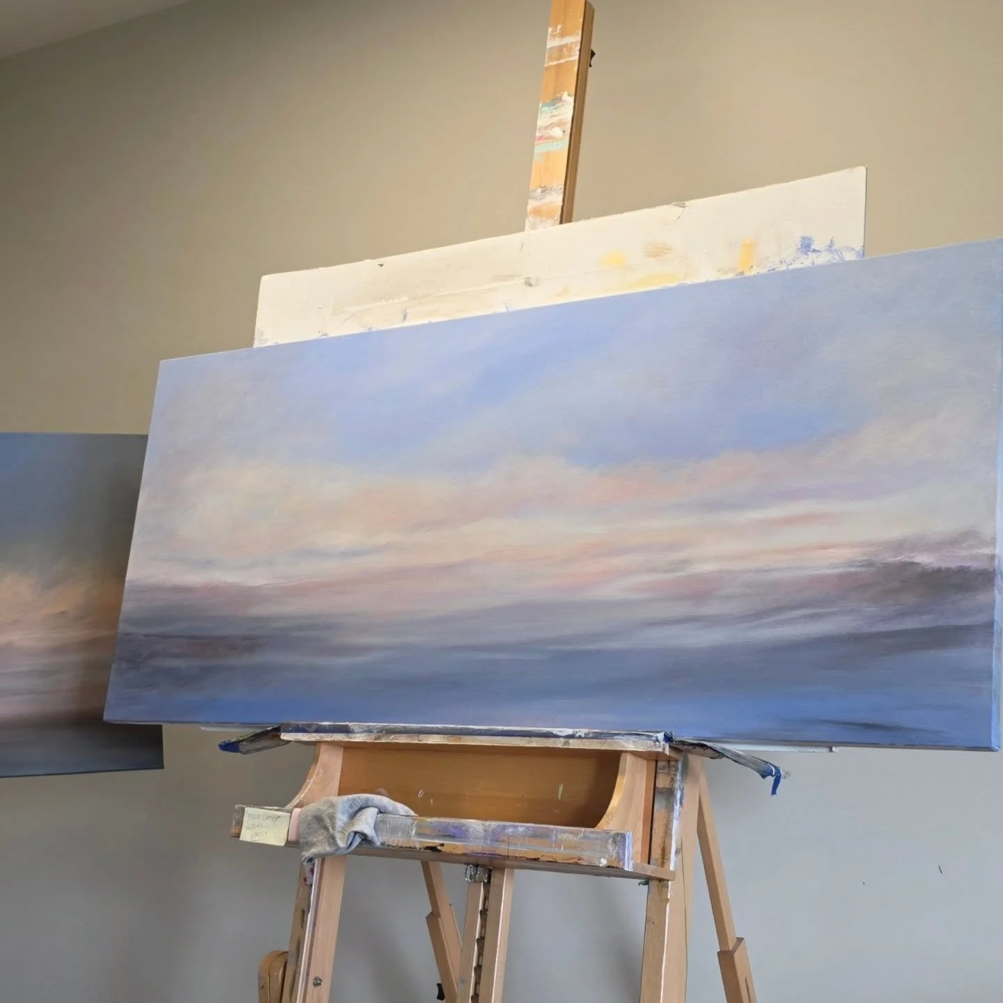 Working on a commission piece that feels like it's almost done. Breath of Heaven is in first place for names at the moment. 
A slight peek in the left corner of one my collectors love. Making sure the two paintings speak to each other, and I believe 