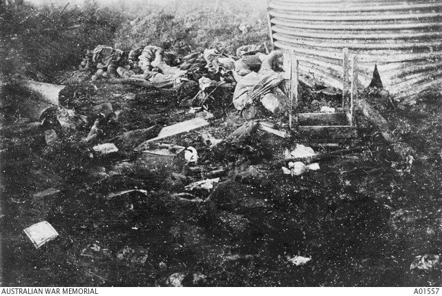  Australian and German dead in the German front line trench.  