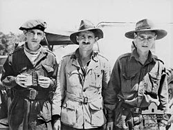  William (Bill) Sticpewich (centre) and Keith Botterill (right). Two of the six survivors.     Courtesy AWM 