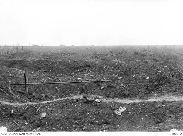  A section of the obliterated trench south of Bapaume Road. Troops moving forward or back had to cross the open ground to reach the communication trenches.   Courtesy: amw.gov.au 