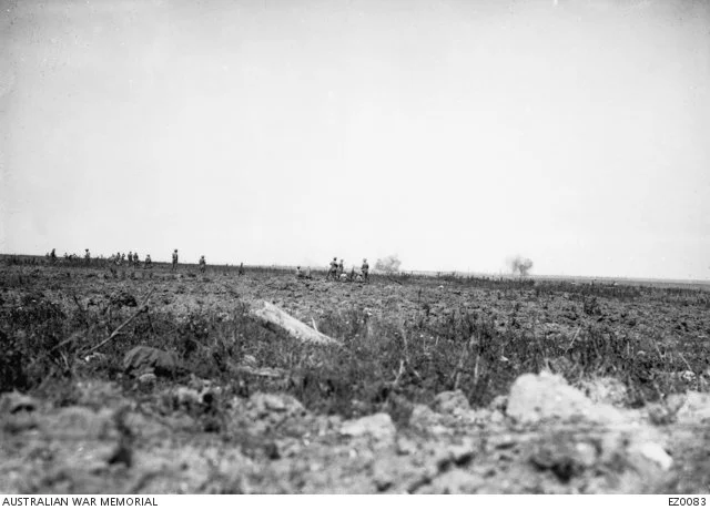  Observers watching the artillery bombardment of the Pozieres position.   Courtesy: awm.gov.au 