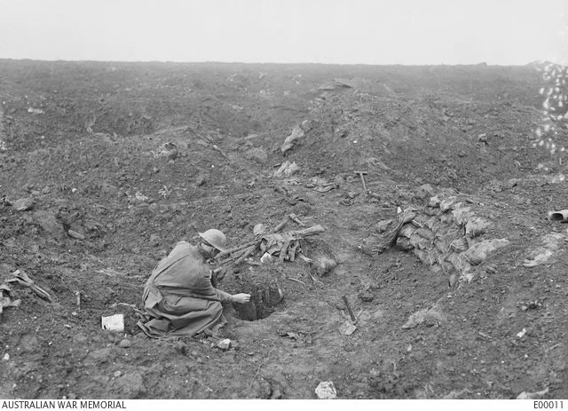  An Australian solder in what was left of OG1, looking towards The Windmill.   Courtesy AWM 