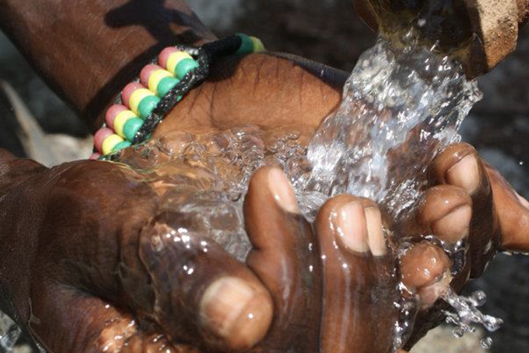 uganda_hands_water.png