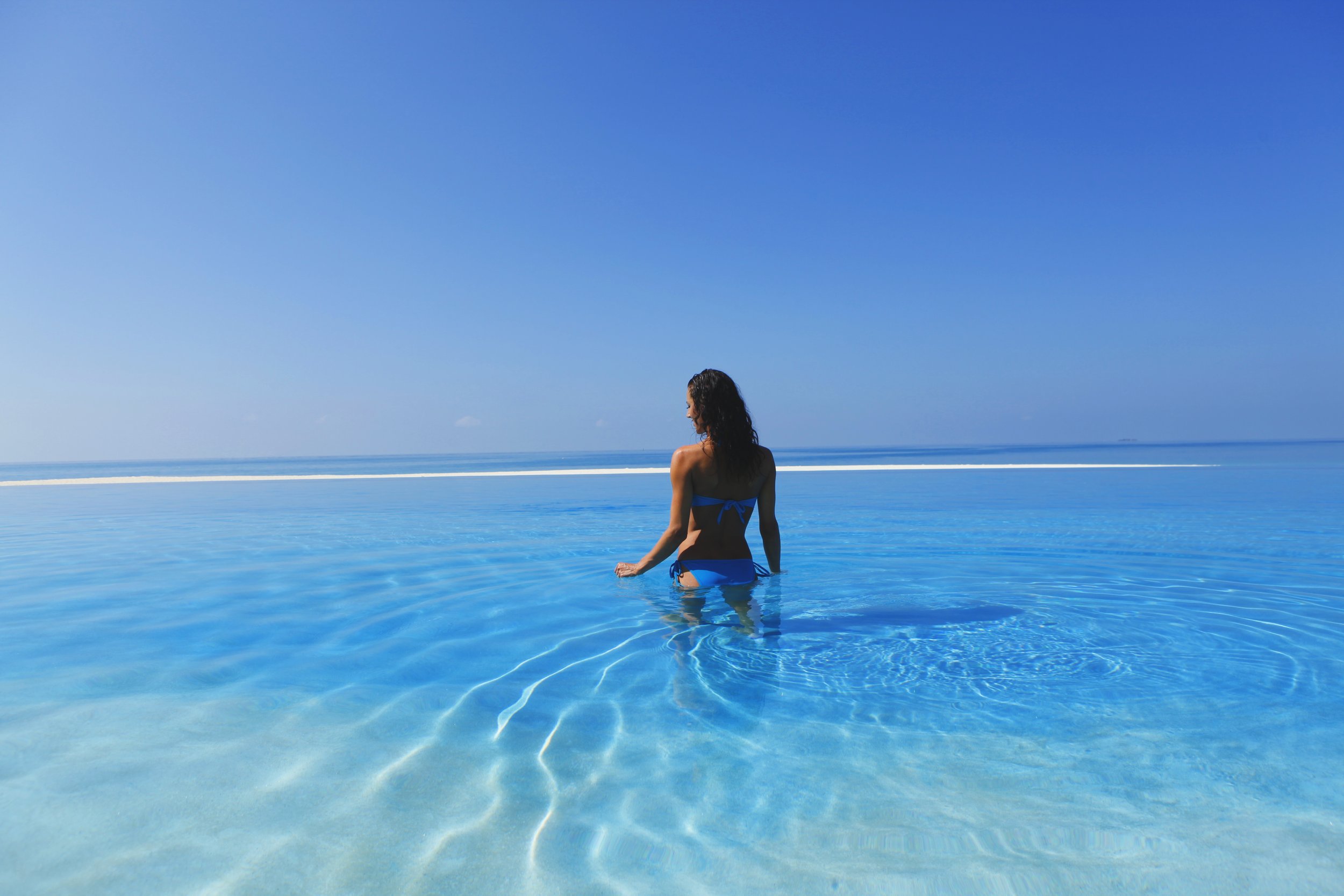 Girl Walking Into Pool.jpg