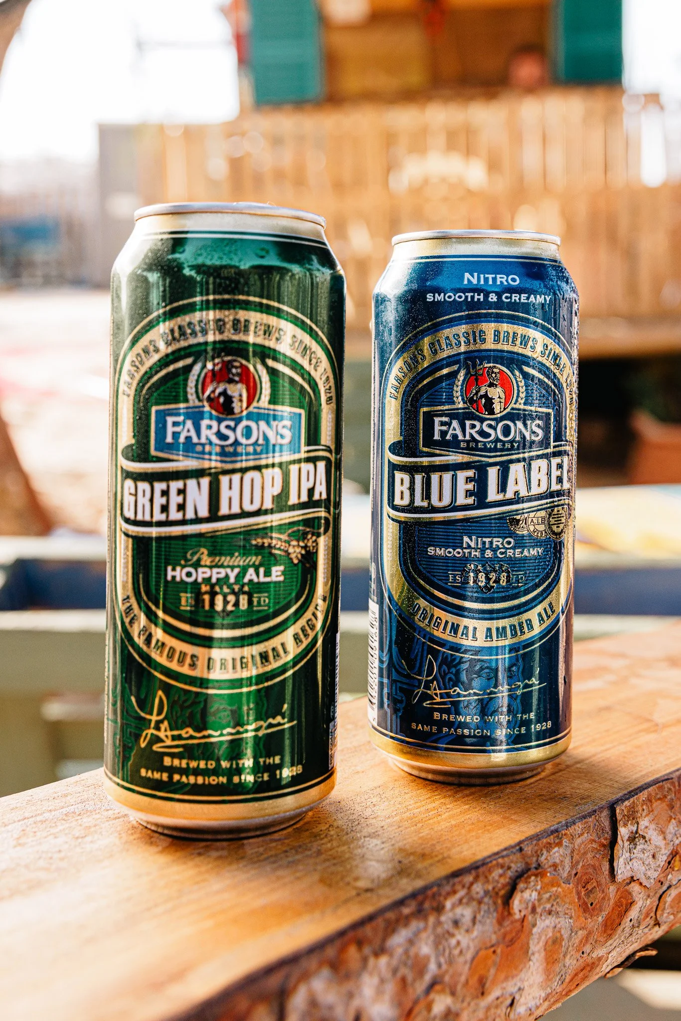 classic brews cans, green hop ipa and blue label, outdoors, summer time photoshoot