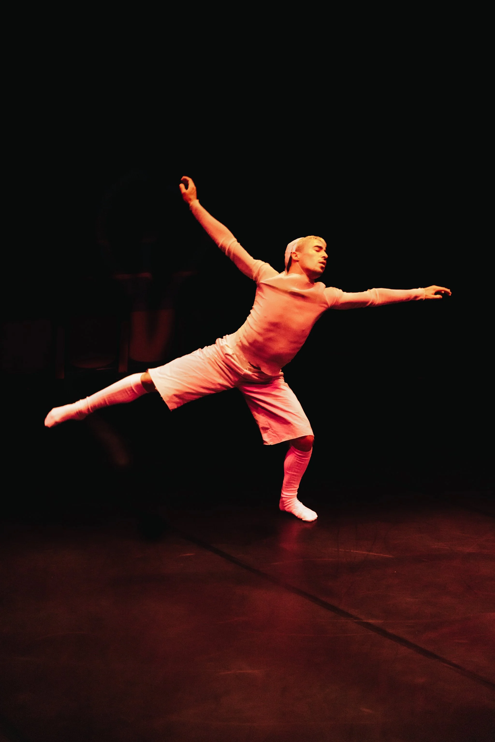 dancer captured in movement, dance photography.