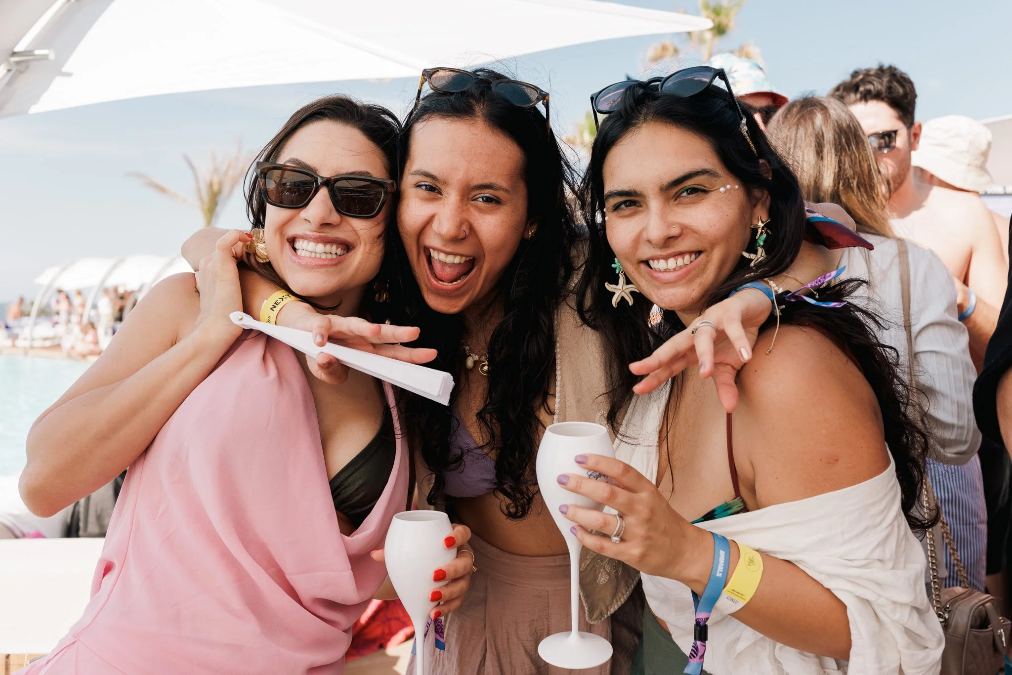 group of women smiling, event photography, igaming company.