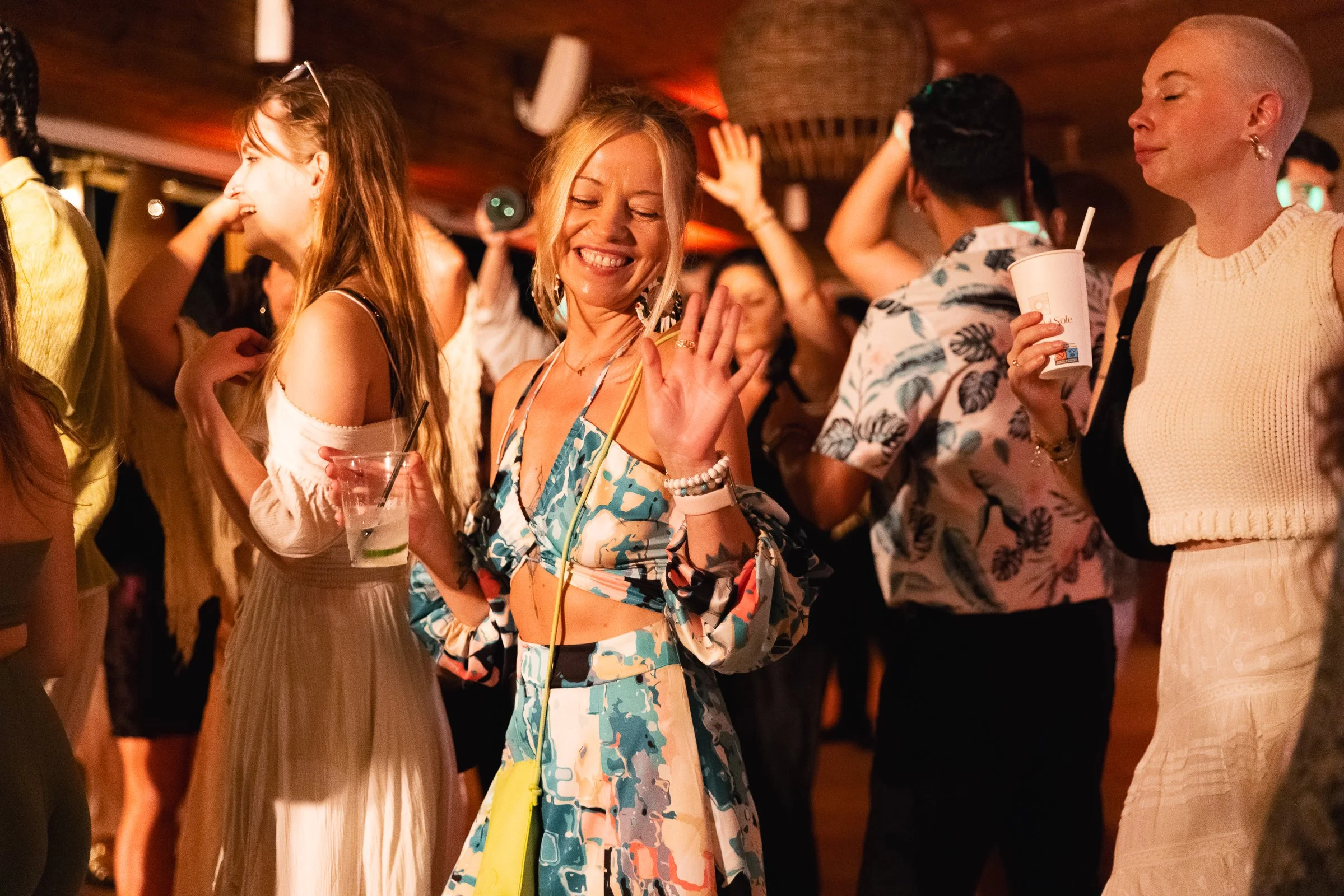 woman dancing, igaming event, summer, event photography.