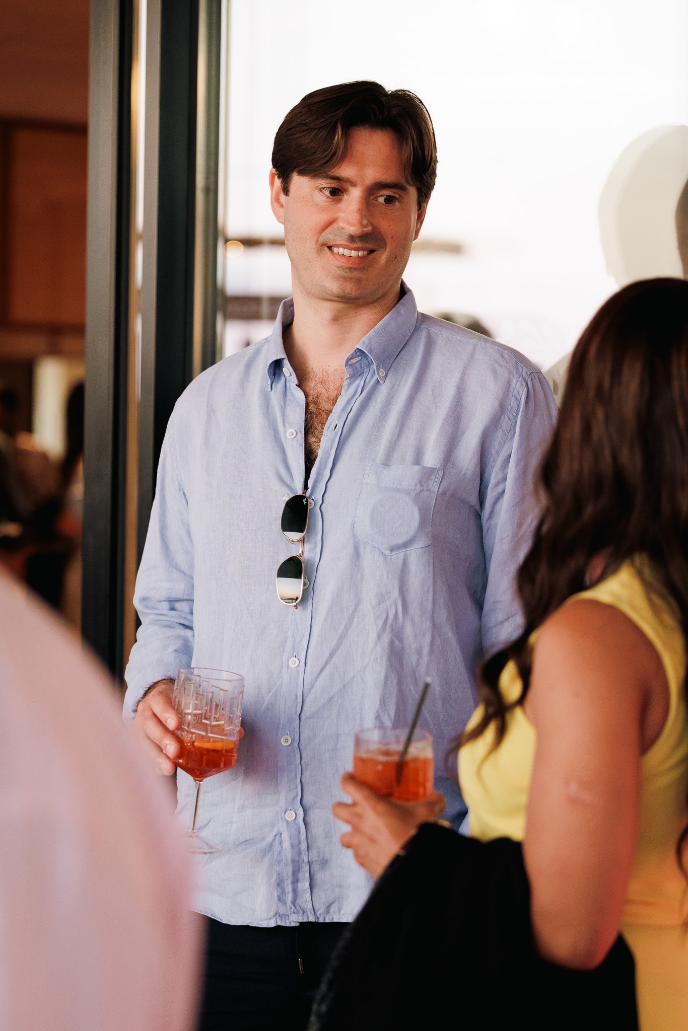 man having a conversation, event photography.