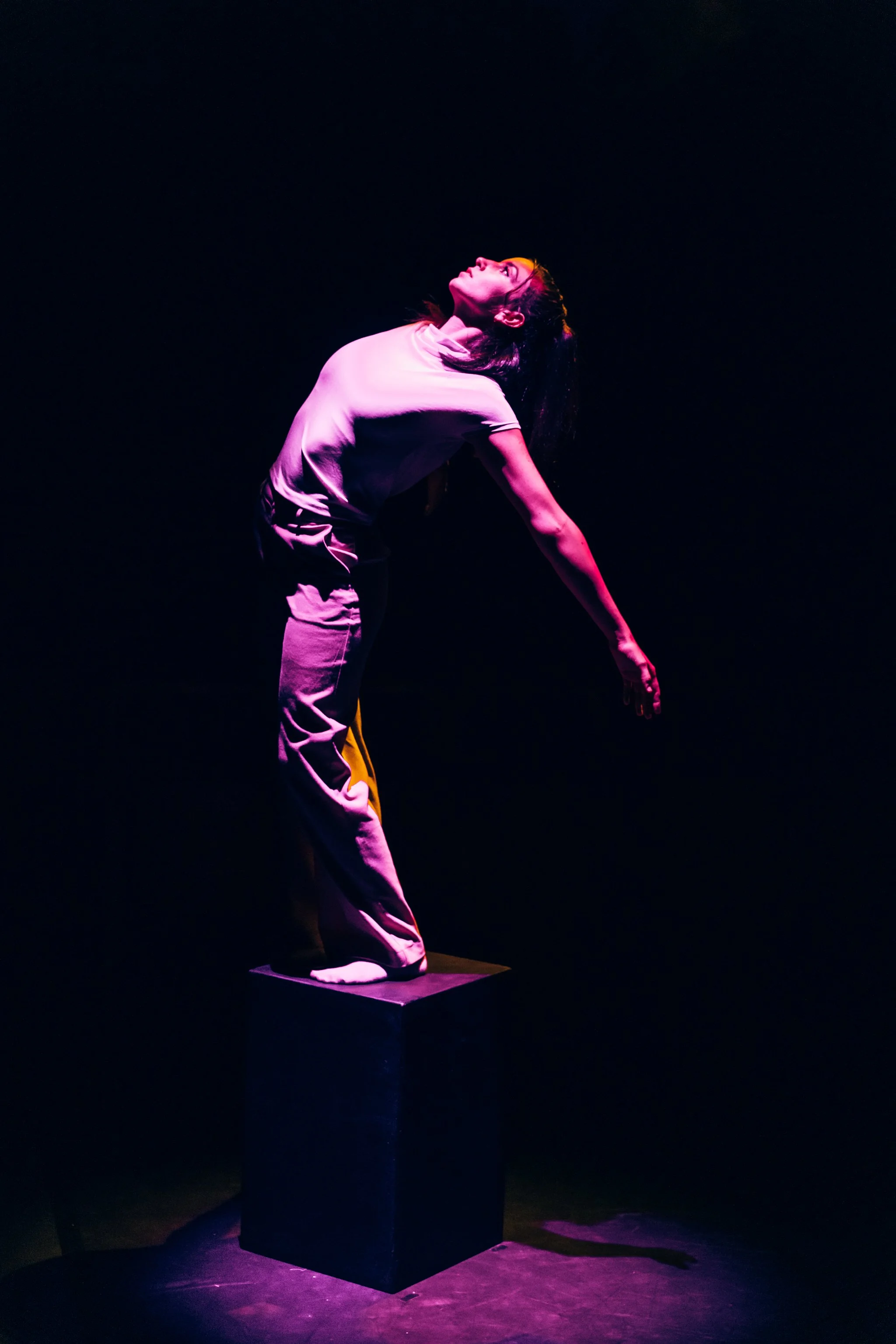 dancer in movement on stage, dance photography.