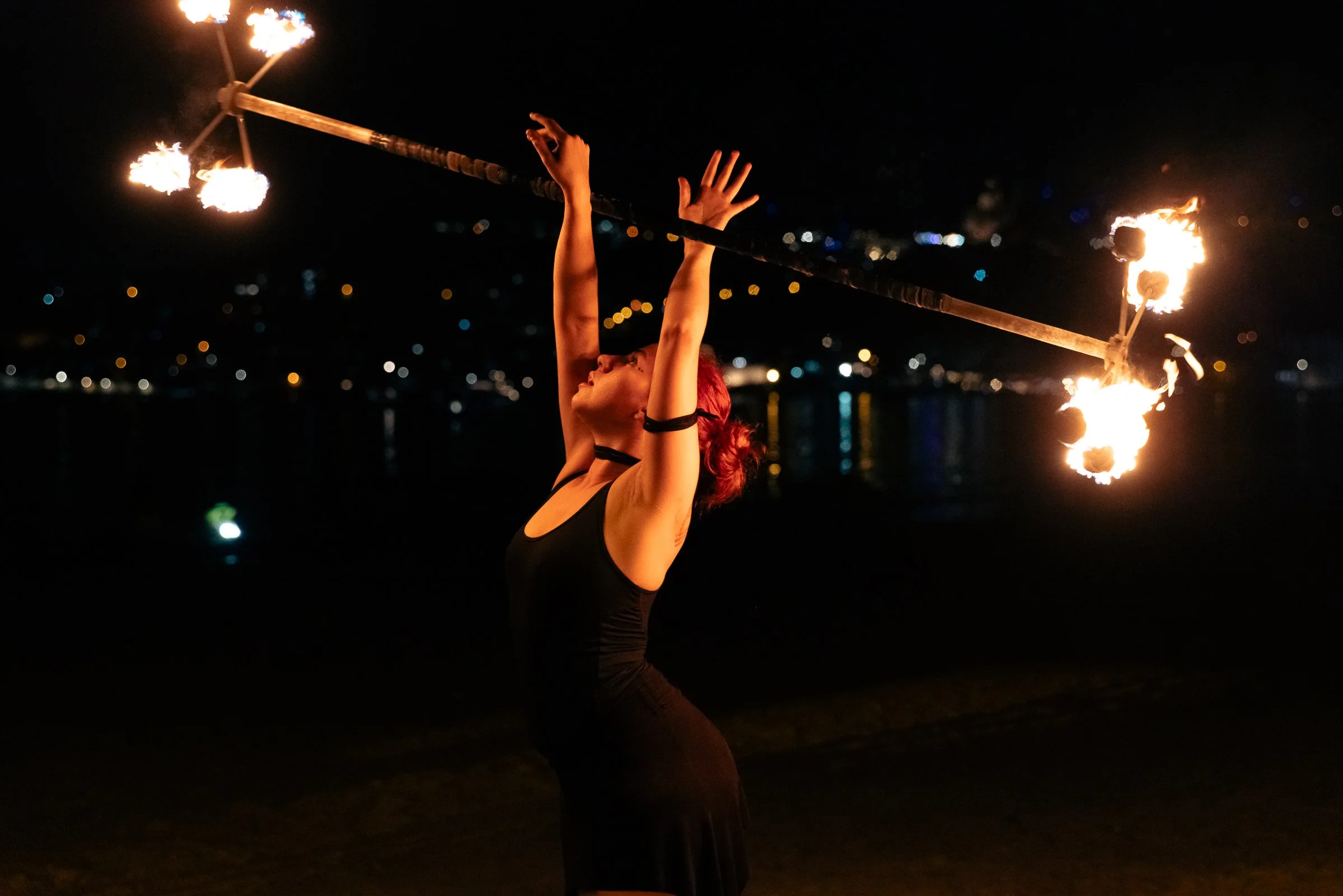 fire juggler by the beach, event photography.