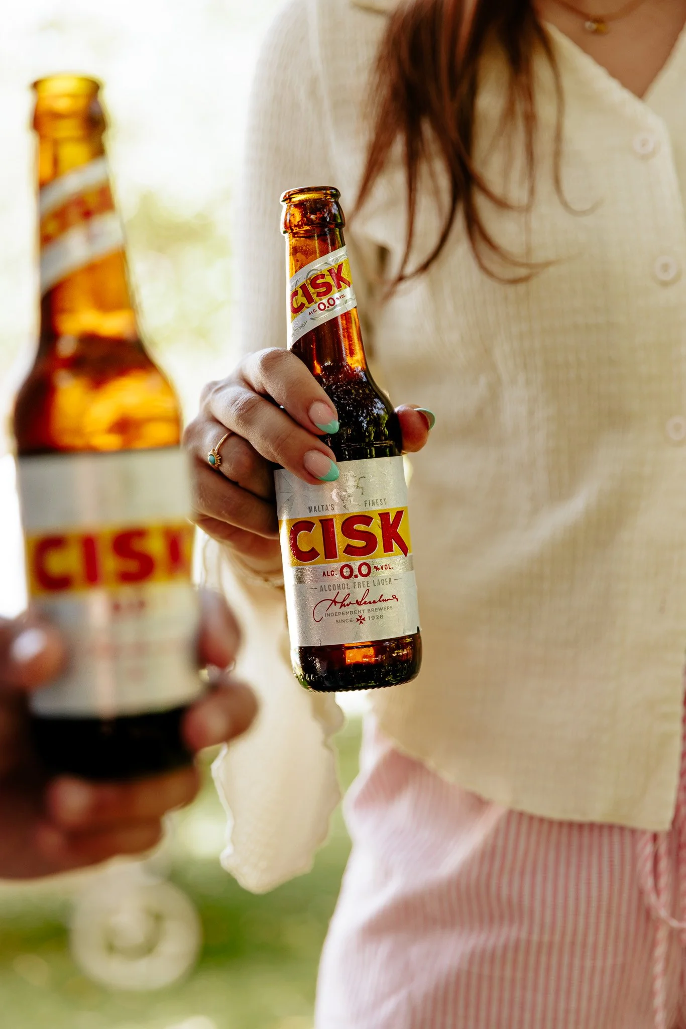 cisk 0.0 beer bottle outdoors summer product shoot