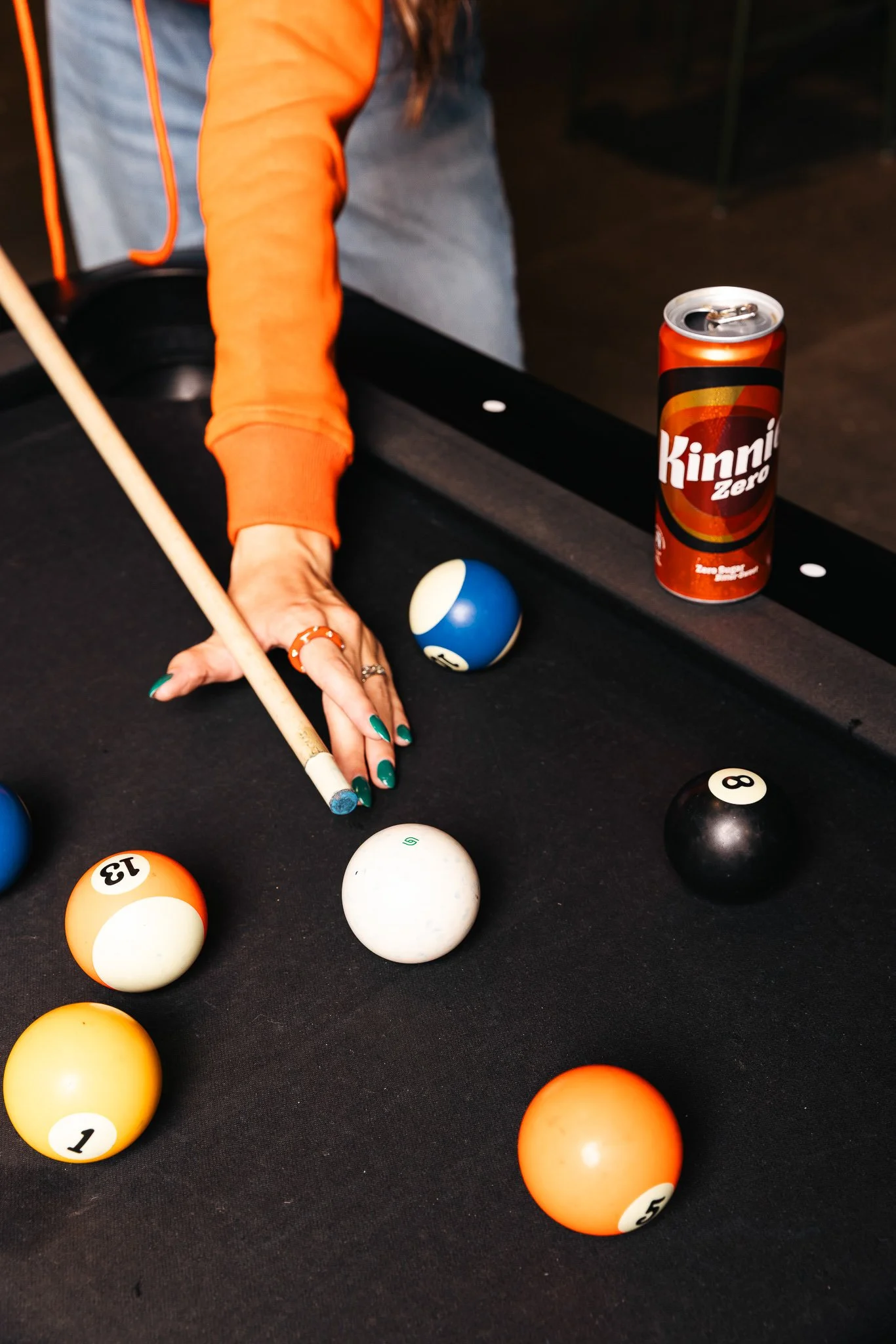 kinnie on a billiard table