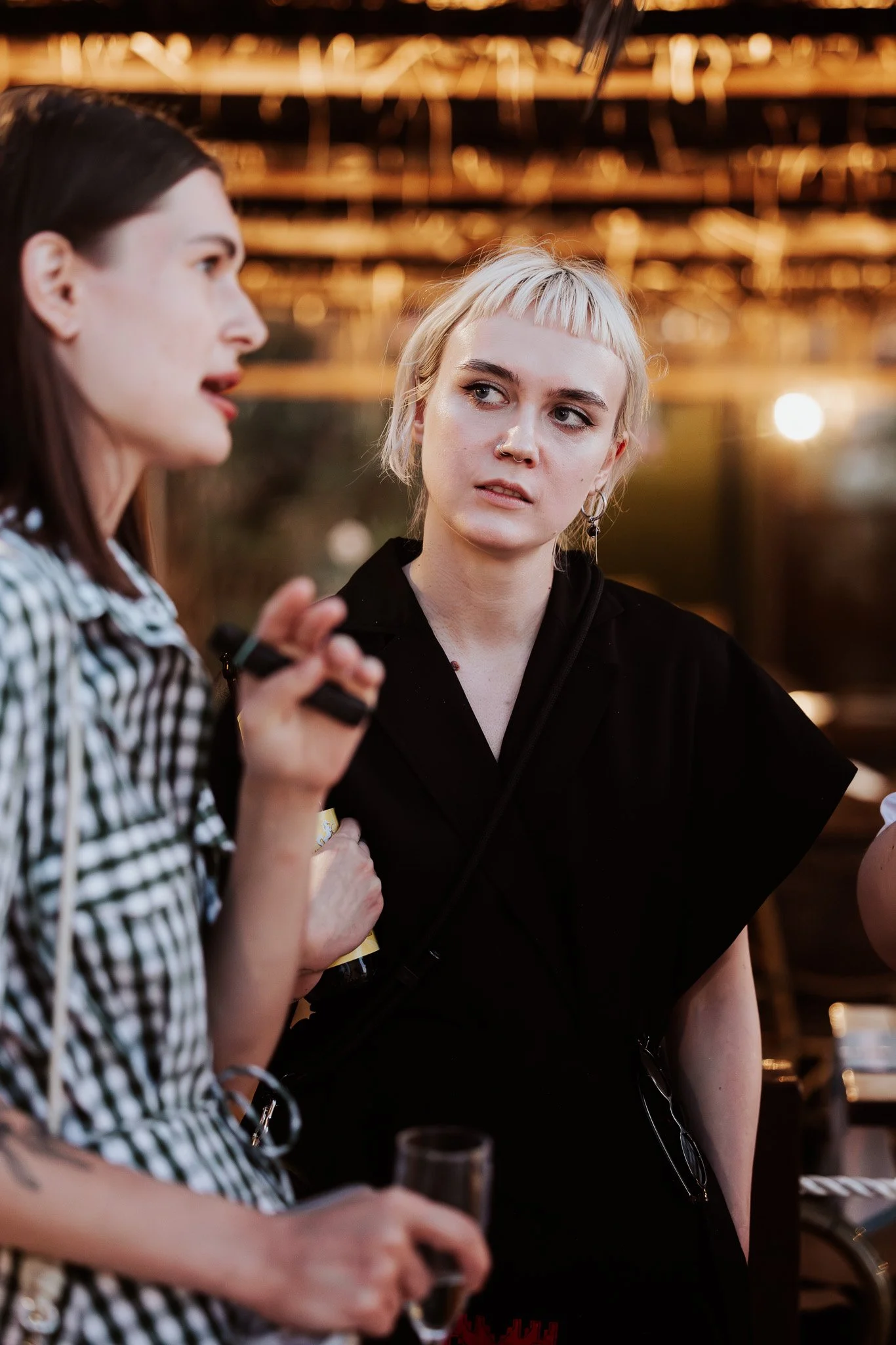 two people having a conversation, event photography.