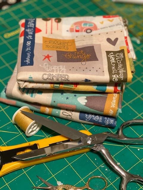 Happy Camper - scattered words fabric 