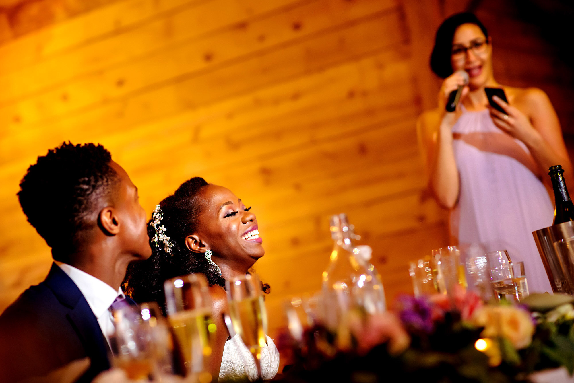 44-Austin-wedding-photographer-Jide-Alakija-reaction to maid of honors speech by couple.jpg.JPG