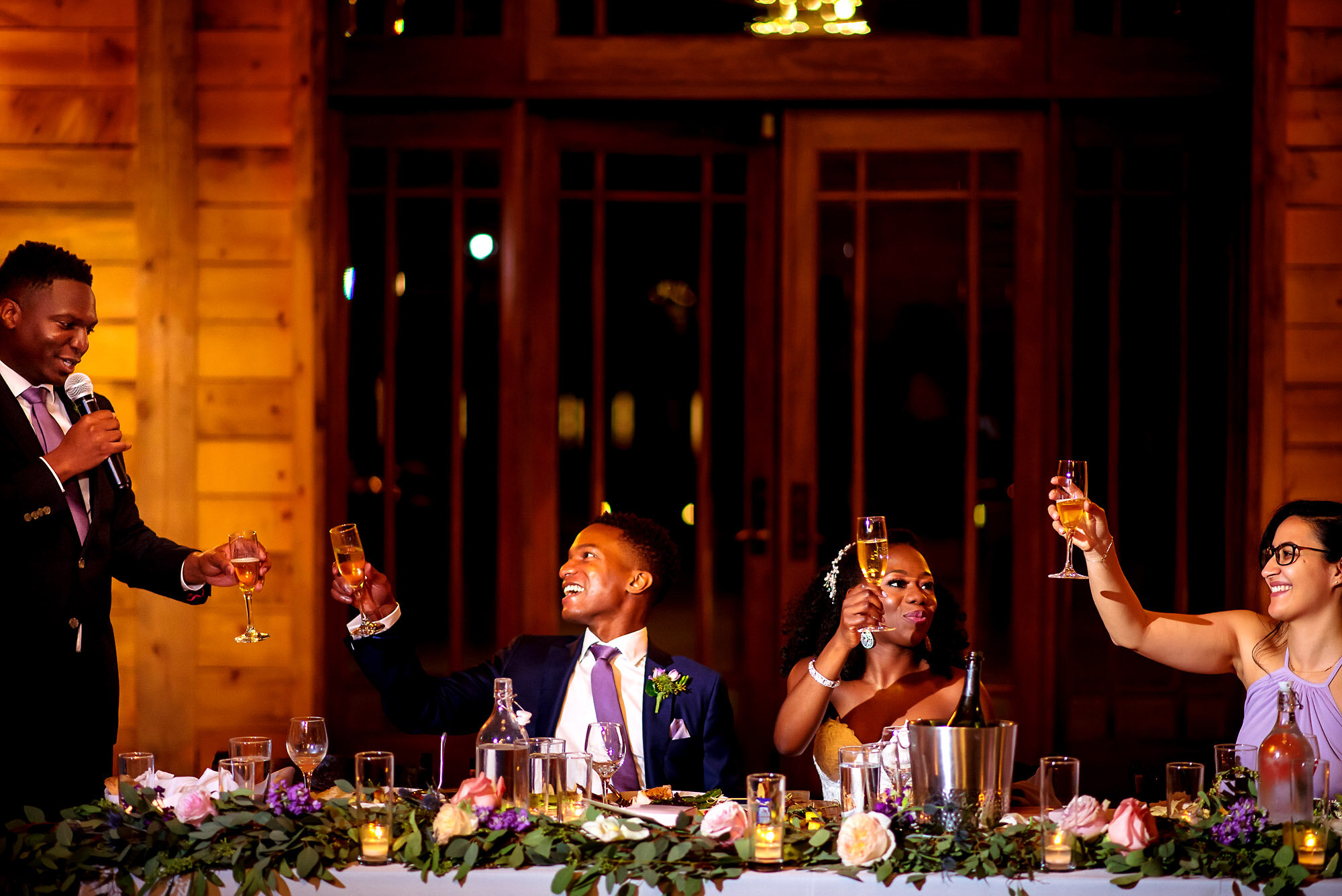 46-Austin-wedding-photographer-Jide-Alakija-toast with couple bestman and maid of honor.jpg.JPG