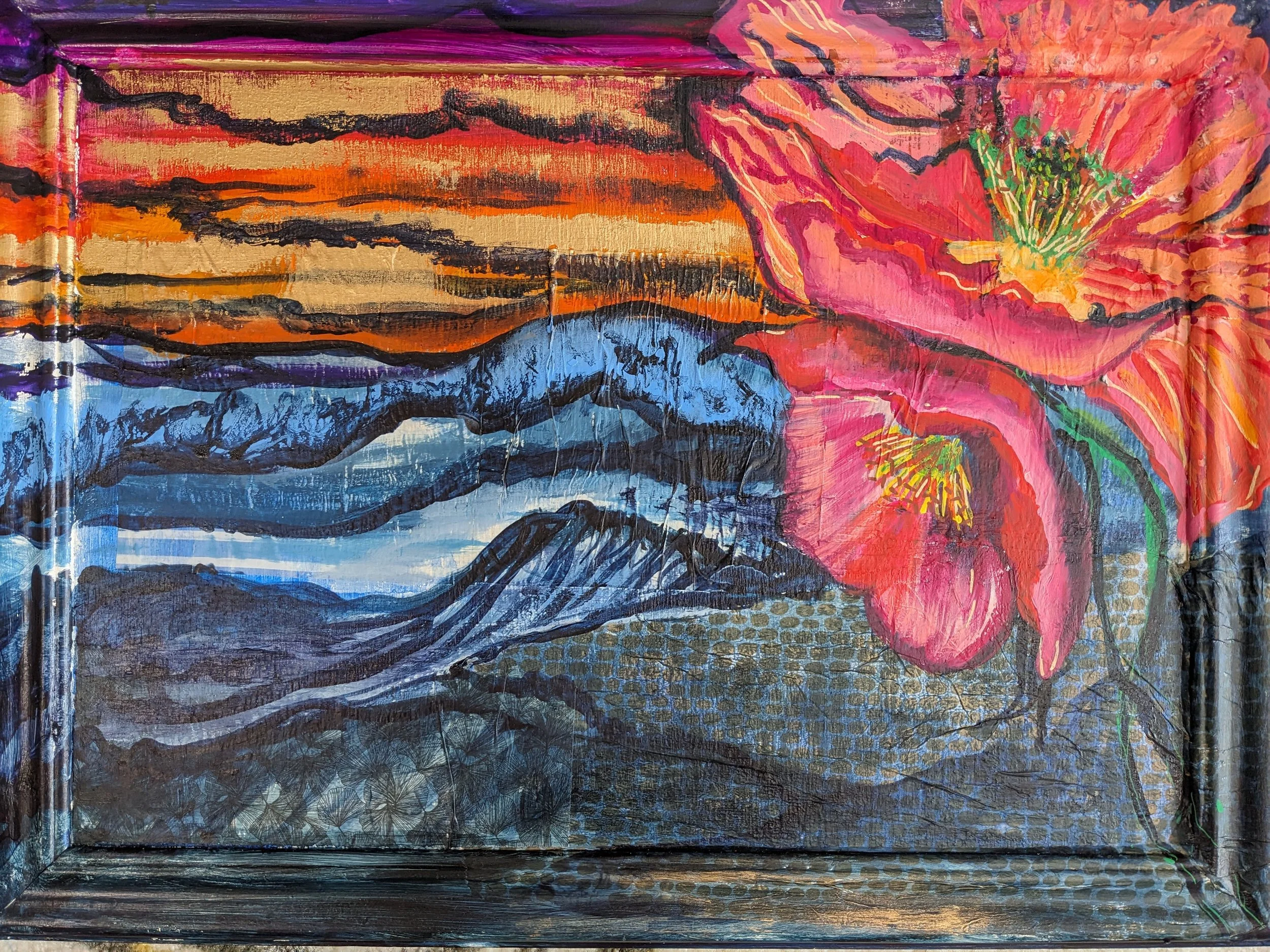 Reckless Abandon 17”x 23” Mixed Media acrylic, collage and oil stick on recycled cabinet door.  The piece is about the feeling of freedom and taking a deep breath while standing on the mountain.  It’s the vulnerability of looking to the future or to 