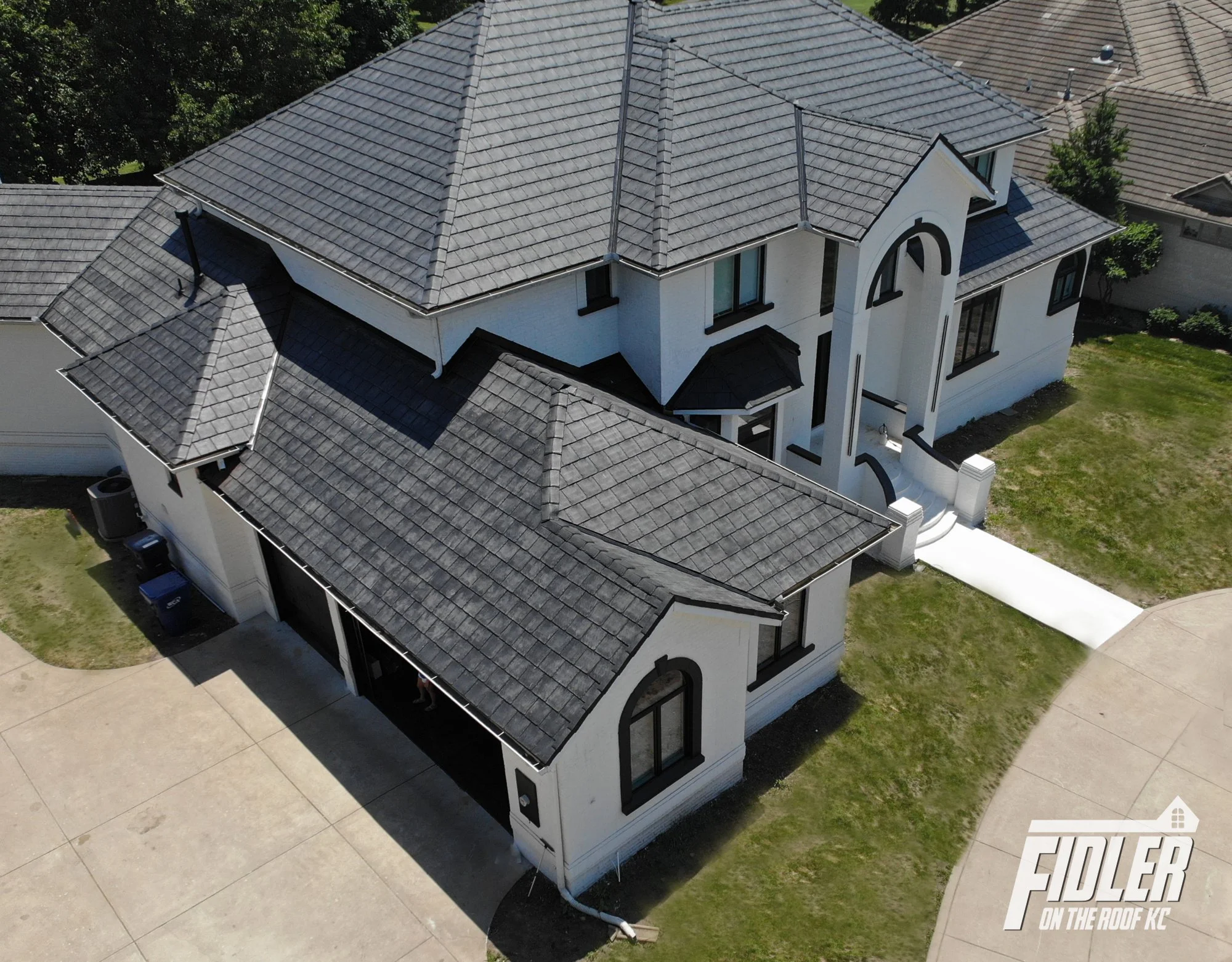 Fidler on the Roof KC is a premium installer of synthetic tile and wood shake roofing in Kansas City.